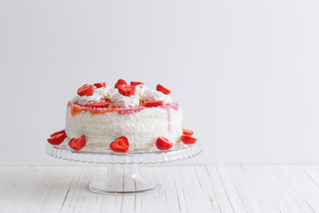 cake with strawberries on white background