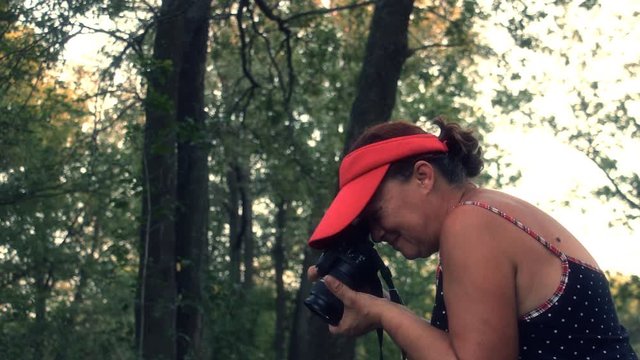 Woman photographing nature 3.