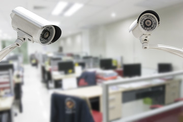 CCTV Camera security operating in office building.