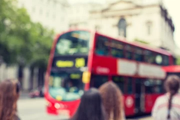 Tuinposter city street with red double decker bus in london © Syda Productions
