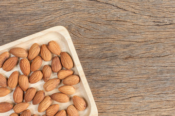 almonds, almonds in a wood bowl