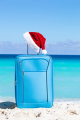 Santa hat on baggage, Christmas vacation