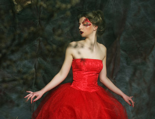 Fototapeta premium Portrait of a beautiful woman in medieval era dress. Shot in a s