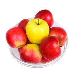 Apples in a glass plate