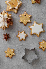 Fototapeta na wymiar Christmas stars cookie on gray background