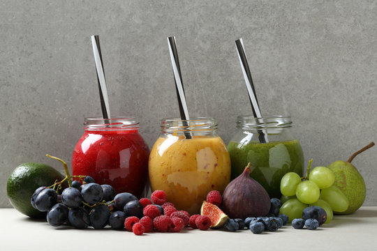 Fresh fruits smoothie in glass jar