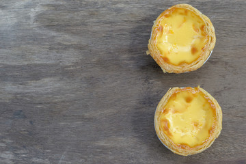 eggs tart on vintage wood background