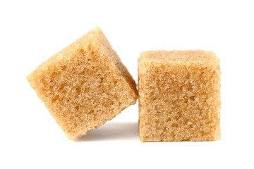 Cubes of brown sugar isolated on white background
