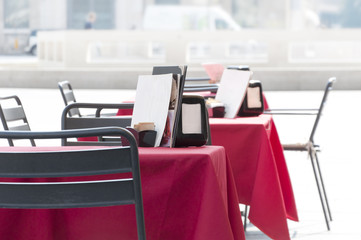 tables of street cafe in the Italian city