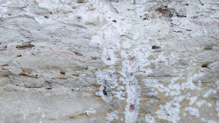 Light gray wall of sandstone