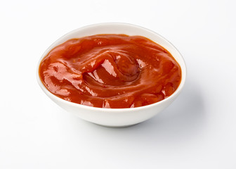 Ketchup in bowl isolated