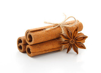 cinnamon stick and star anise spice isolated on white background closeup