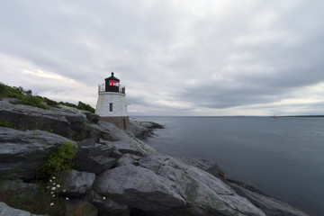 Fototapeta na wymiar Lighthouse on a rocky shore.
