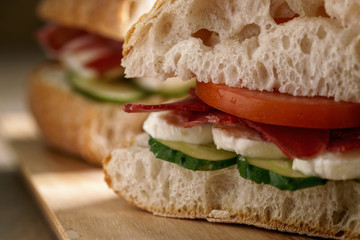 italian sandwich with speck and mozzarella