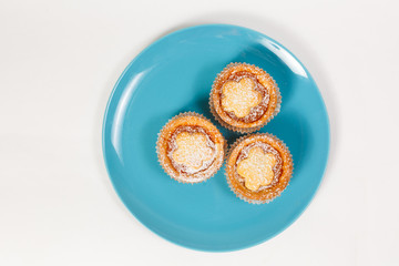 pumpkin dessert on a white background in a blue plate