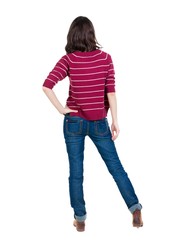 Fototapeta premium back view of standing young beautiful brunette woman in red pullover. girl watching. Rear view people collection. backside view of person. Isolated over white background.