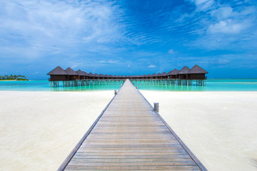 Fototapeta premium beach with water bungalows at Maldives