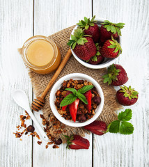 Homemade granola with strawberries