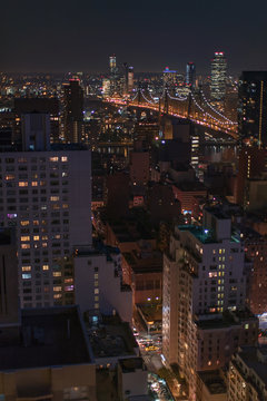 Fototapeta NYC by night with Queensboro Bridge