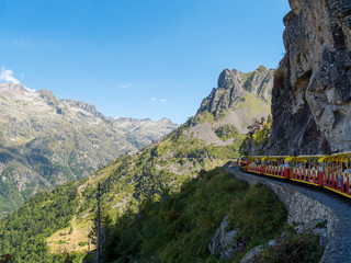 Naklejka premium train of Artouste with cliffs