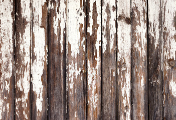 Fototapeta premium Vertically stacked old boards with rusty nails