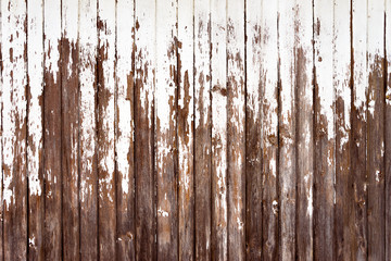 Vertically stacked old boards with rusty nails