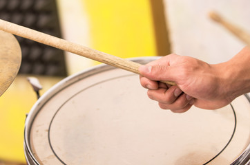 closeup shot of musician playing drums