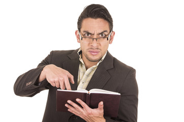 angry school teacher holding book