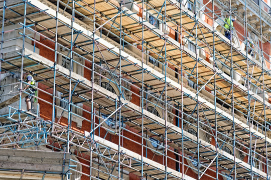 Fragment of scaffolding against house wall in Central London