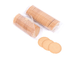 Natural cookie thins in skinny plastic sleeve on white background