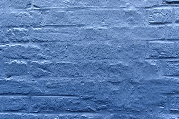 Blue brick wall background.