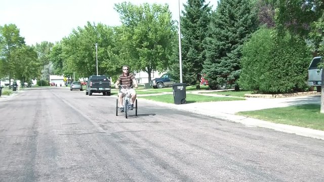 Man Riding Trycycle Bike