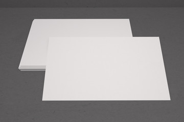 Mock up business card and cover horizontal format. White paper card on table, for your design and template. Three-dimensional rendering.