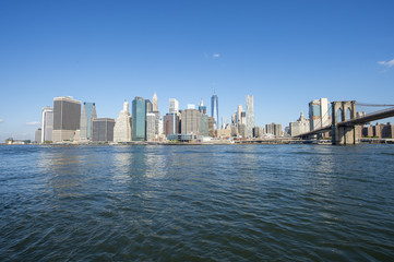 Fototapeta premium New York City skyline view from Brooklyn of the Manhattan Bridge with East River