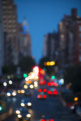 Abstract defocus view of traffic headlights and taillights on the city street