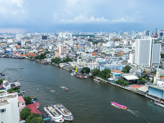 Fototapeta na wymiar Bangkok cityscape with Chaopraya river on blue sky day, Bangkok