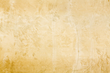 Horizontal rustic gold stucco texture wall background