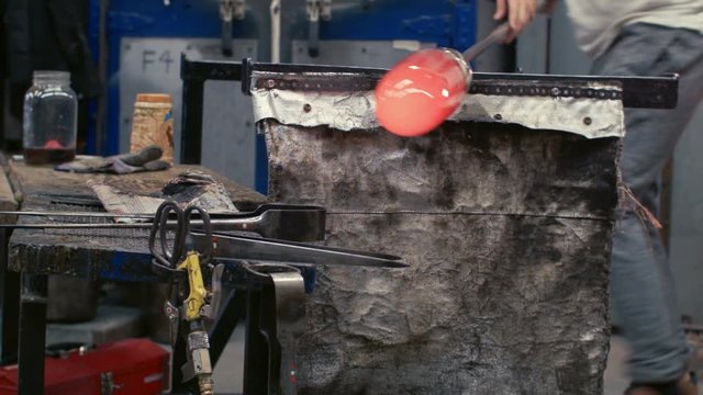 Blowing Glass - Mesuring a piece with a caliper