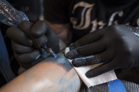 Man getting tattooed