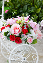 Decorated Flowers Bunch In White Cart On The Floor