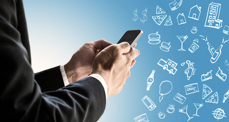 Businessman using smartphone with expense doodle images, paying bills online by smartphone concept
