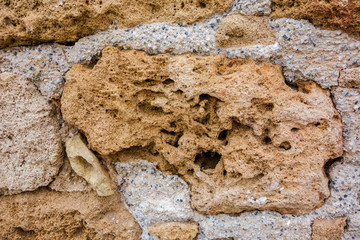 Porous natural stone.