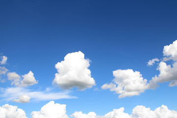 Naklejka na ściany i meble white clouds in the blue sky background