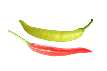 Red and green peppers on a white background.