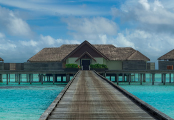 Vacaciones de luna de miel ,Overwaterbungalow en Islas Maldivas en pleno Océano ïndico