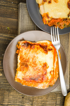 Overhead Shot Of Portion Of Roasted Meat Lasagna