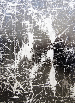 Scratched black silver background texture