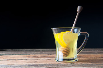 Hot drink with honey and lemon. Copyspace