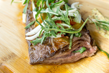 juicy steak veal - beef meat with tomato and vegetables