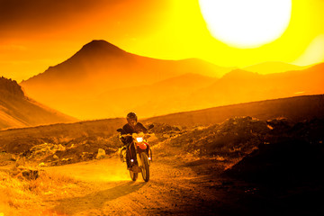 Fototapeta premium silhouette of the mountain motor drive